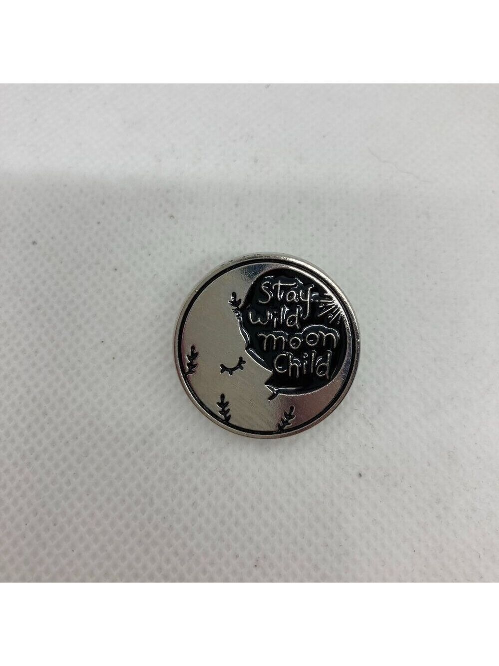 New “Stay wild moon child” pin